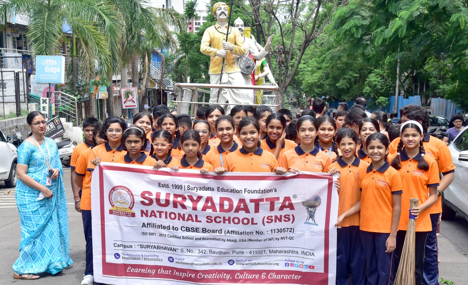 Students of Suryadatta National School  Cleaned the Warkari Sculptures at Bavdhan