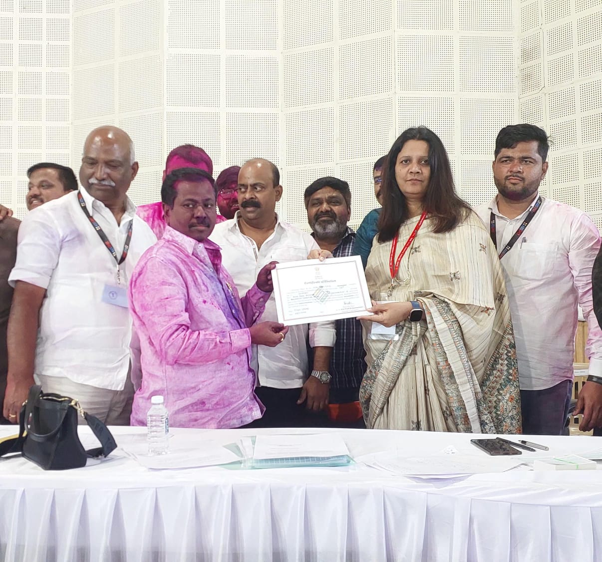 Anna Bansode winning election certificate handed over by Election Decision Officer Archana Yadav